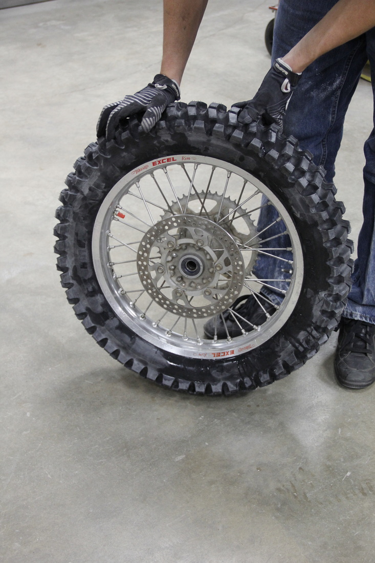 an ice tire that is ready to be studded